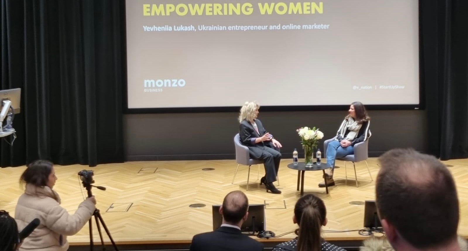 Yev Lukash speaking at an empowering women event